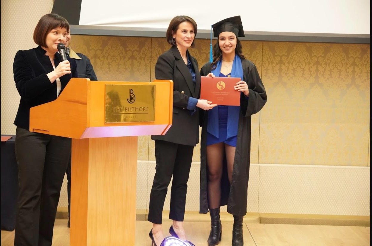 Fatemeh Naderi receiving her DMD diploma